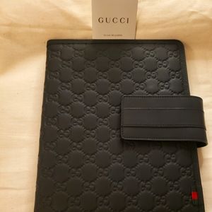GUCCI Guccisima black IPad case with flap closure. Length: 9.5" Width: 7.5"